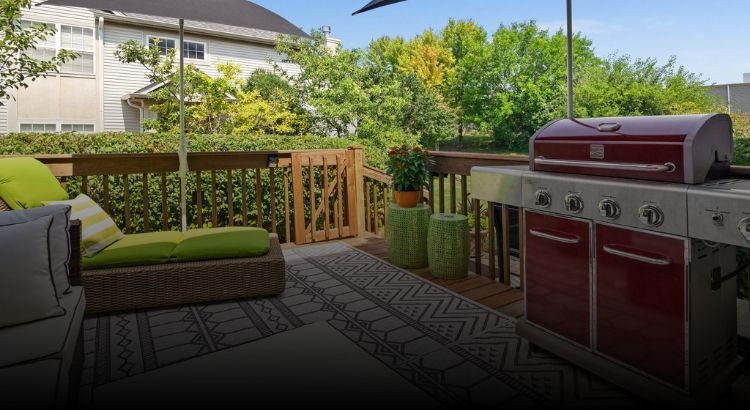Photo of deck with gas grill at 31 Oak Creek Ct in North Aurora, Illinois